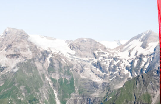 austrian flag at a mountain