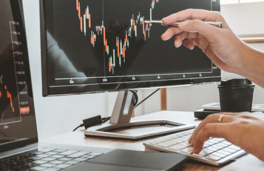 Investment stock market Entrepreneur Business team discussing and analysis graph stock market trading,stock chart concept