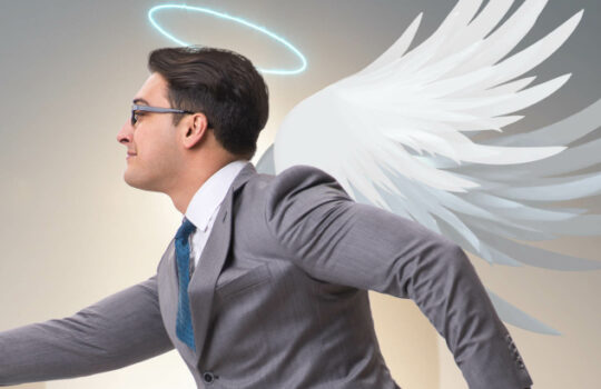 The angel investor concept with businessman with wings