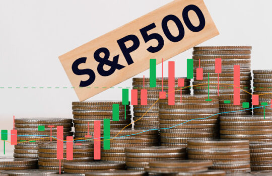 stock S and P 500 Index fund symbol is on wooden cubes in stack coins symbolizing that the S and P 500 Index is changing the trend, goes up instead of down. Business, S and P 500 concept.