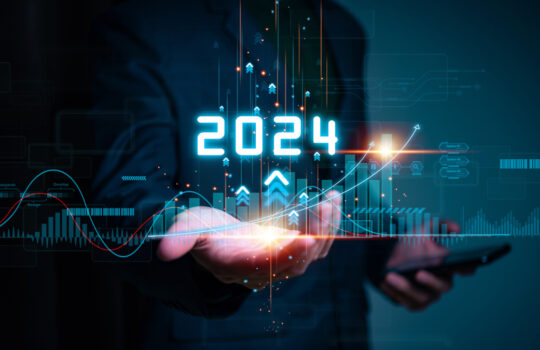 Businessman hand holding the increase arrow graph corporate future growth year 2023 to 2024. New Goals with Plans and Visions for Next Year 2024, Opportunity, challenge and business strategy.