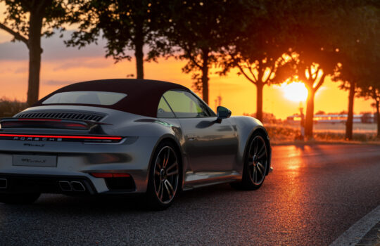 Porsche Aktie - Porsche 911 Turbo S Cabriolet on the road