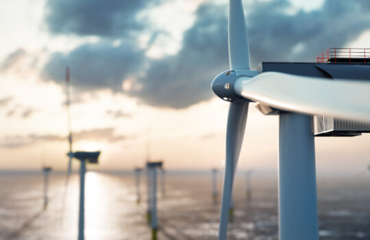 RWE Offshore wind power and energy farm with many wind turbines on the ocean. Sustainable electricity production