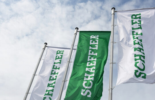 Ingolstadt, Bavaria / Germany - May 20, 2018: Flags with the logo of Schaeffler AG in Ingolstadt, Germany - Schaeffler Group is a manufacturer of rolling element bearings for automotive and industrial use