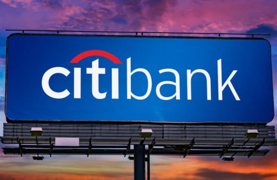POZNAN, POL - MAR 7, 2023: Advertisement billboard displaying logo of Citibank, the primary U.S. banking subsidiary of financial services multinational Citigroup