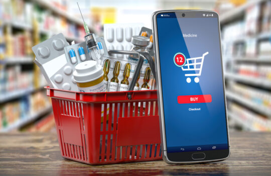 Mobile service or app for purchasing medicines in online pharmacy drugstore. Smartphone and shopping basket full of medicines. 3d illustration