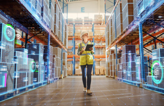 Futuristic Technology Retail Warehouse: Worker Doing Inventory Walks when Digitalization Process Analyzes Goods, Cardboard Boxes, Products with Delivery Infographics in Logistics, Distribution Center