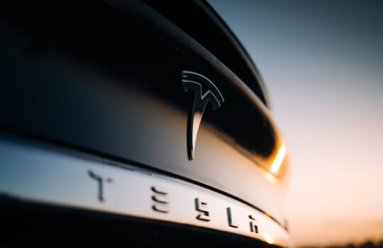 Tesla Model X P100D interior logo at the rear trunk. Elon Musk Tesla motor company bage and logo at the rear part of a car