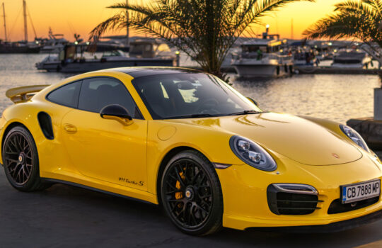 Marina Dinevi, Sveti Vlas, Burgas, Bulgaria - 07.28.2023, Yellow Porsche 911 Turbo S at sunset