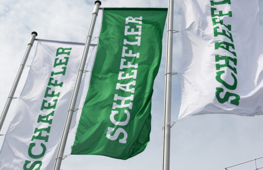 Ingolstadt, Bavaria / Germany - May 20, 2018: Flags with the logo of Schaeffler AG in Ingolstadt, Germany - Schaeffler Group is a manufacturer of rolling element bearings for automotive and industrial use