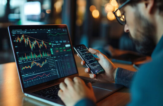 Investor using mobile phone and laptop checking trade market data. Stock trader broker looking at computer analyzing trading cryptocurrency finance market crypto stockmarket data, Generative AI