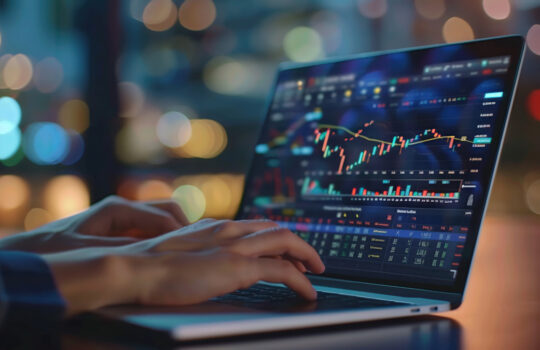 Close-up of a finance professional analyzing real estate portfolios on a laptop, corporate setting, vibrant screen display, clear focus, high detail