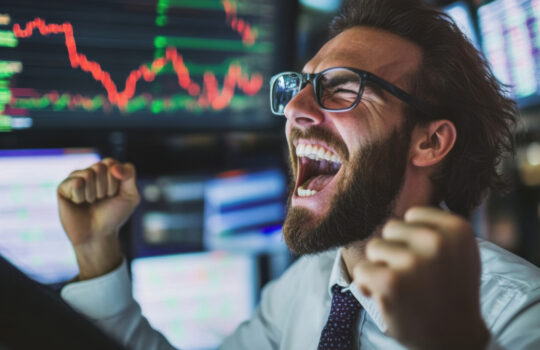 Happy Stock Market Trader Celebrating Profitable Trade Success with Joy and Excitement.