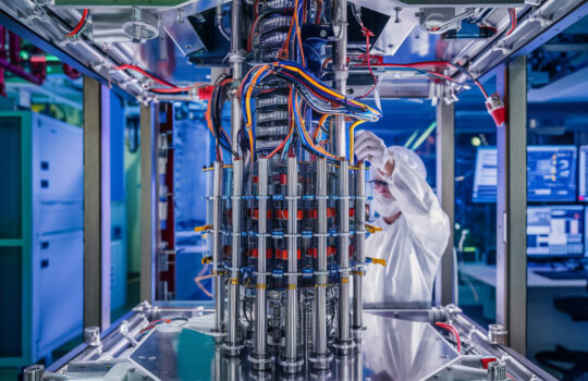 Technician working on a cryogenic quantum computer setup