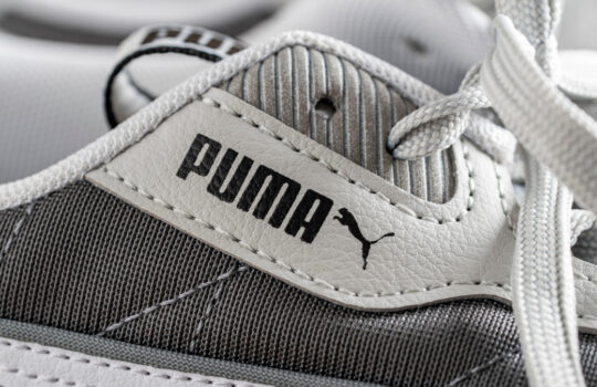 Kyiv, Ukraine - November 17, 2023 : Beautiful new Puma white sneakers , close up