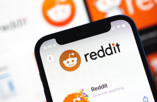 Reddit logo displayed on a smartphone device close-up view photo