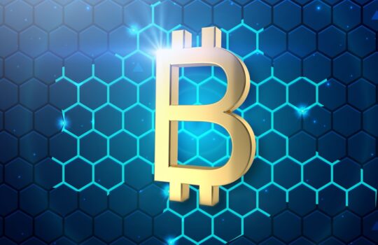 a golden bitcoin on a blue hexagonal background