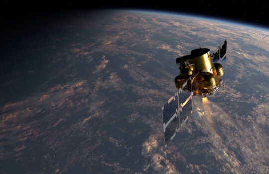 Satellite with large solar panels orbiting above Earth's horizon in space.