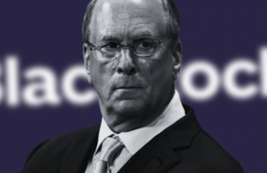 Professional portrait of a man in a suit with a blurred 'BlackRock' logo in a dark purple background behind him.