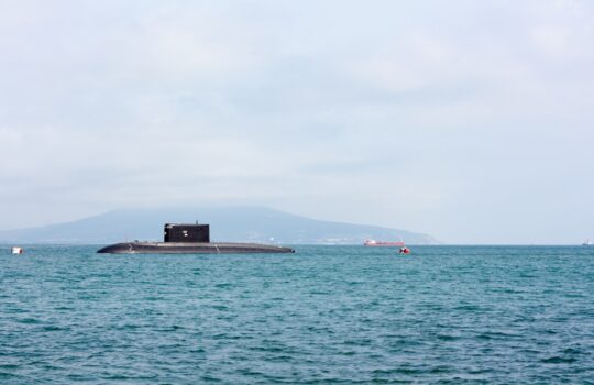 a submarine floating on top of a large body of water