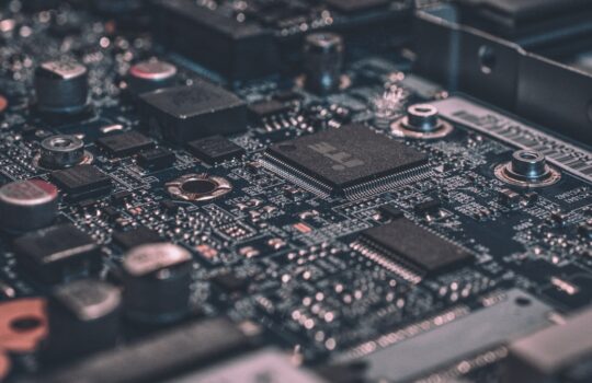 macro photography of black circuit board