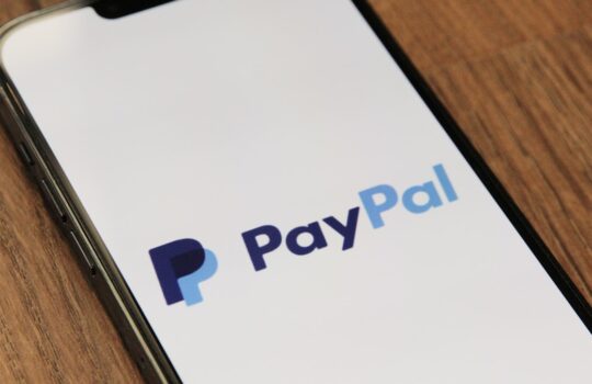 a phone with a pay pay logo on it