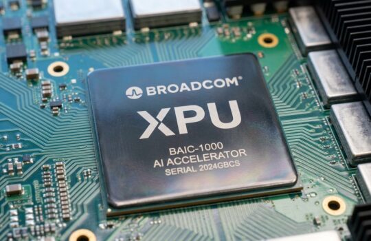 Broadcom XPU AI accelerator chip mounted on a green printed circuit board.